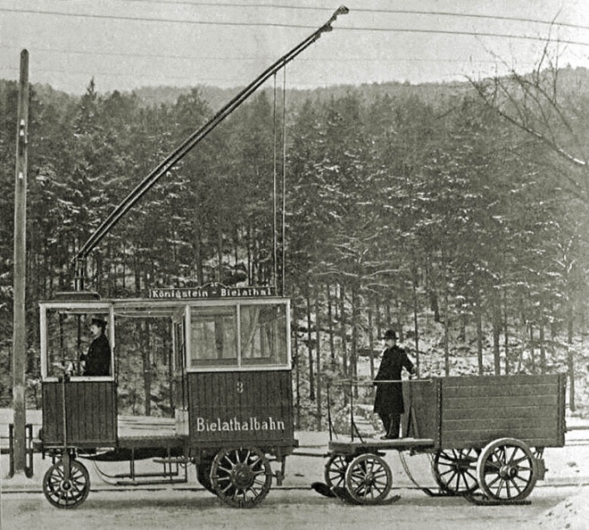 Один із перших вантажних тролейбусів, сконструйованих і збудованих Максом Шиманном для лінії "Білатальбан". У тролейбусі-тячачі були передбачені місця для пасажирів. 1900-ті рр.