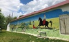 Переселенець з Харківщини малює на Волині патріотичний мурал