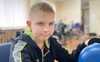 Пережив кому і 8 операцій: історія хлопчика з Харкова, який потрапив під касетний обстріл