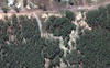 Опубліковано супутникові знімки місць масового поховання поблизу Ізюма